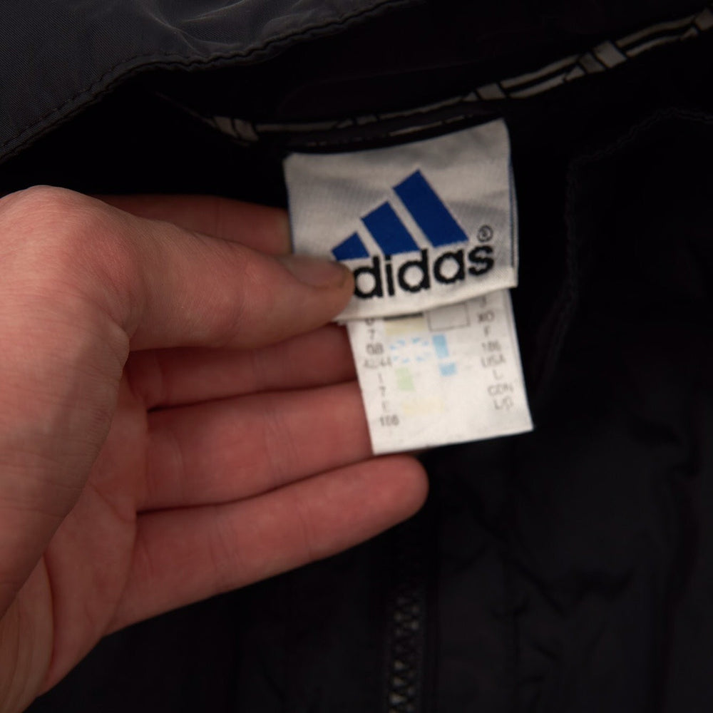 
            
                Load image into Gallery viewer, Vintage Adidas Puffer Coat Black Large
            
        